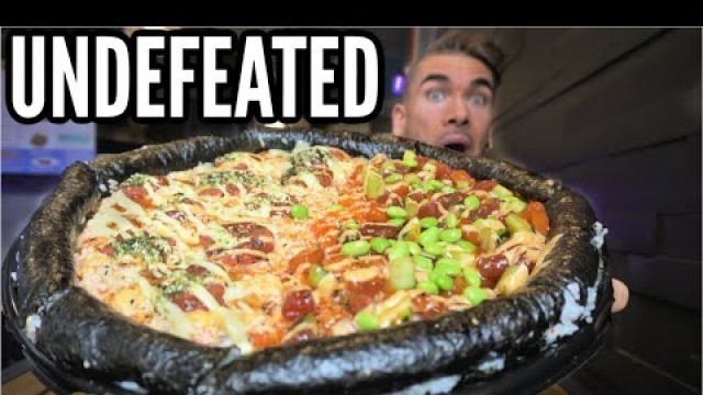 'UNDEFEATED SUSHI PIZZA CHALLENGE | Giant Sushi Roll In Philadelphia  | Man Vs Food'