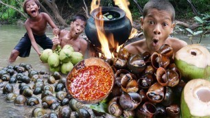 'Primitive Technology - Kmeng Prey - Cooking Snails With Coconut'