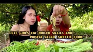 'cute girl’s eating boiled snails and papaya salads delicious |Sweetie food|'