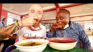 'Extreme GHANA CHOP BAR Food!! Giant African Snail & Goat Meat | Kumasi, Ghana'