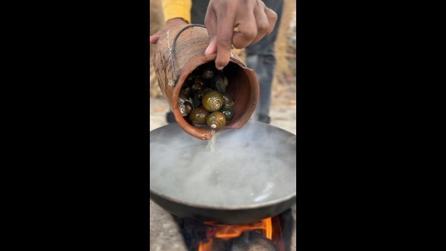 'Snail Cooking And Eating #shorts #ytshorts #trending #explore'