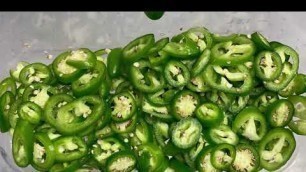 'Univex UFP13 Food Processor Slicing Jalapeño Peppers'