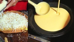 'Street Food Indonesian-pancakes filled with peanut cheese and chocolate (martabak manis)'