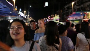 'Jalan Alor at night with L.O.V.E song by the Trio.'