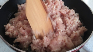 'Recipe from chef minced chicken minced in a frying pan for food'