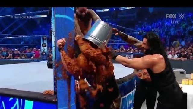 'Roman Reigns punish the king corbins in dog food fight . In wwe'