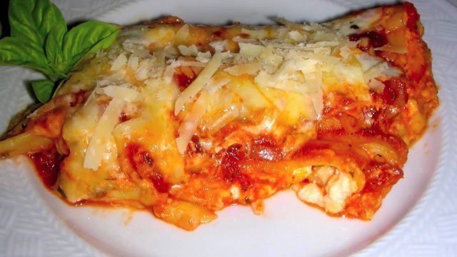 'Manicotti Recipe - Italian Food - Watch how to stuff manicotti noodles by hand'