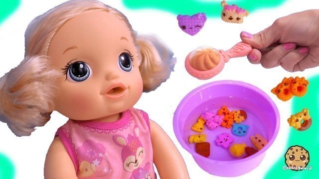 'Feeding Baby Alive Num Noms Magic Cereal Surprise Blind Bags - Toy Video'