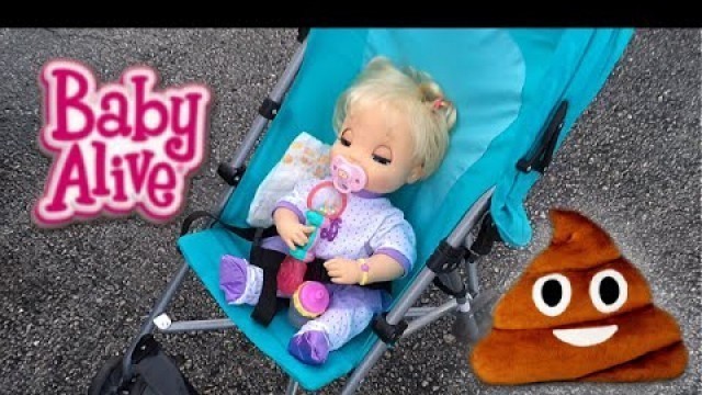 'Baby Alive Doll Beatrix goes on a Park Outing and gets Poop Emoji Pillow'